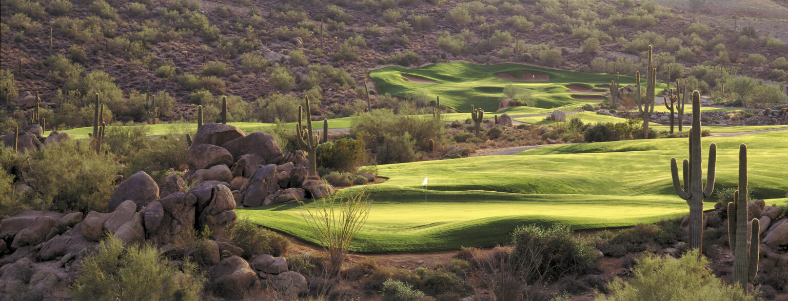 SunRidge Canyon Golf Club fairway winding through desert boulders and saguaros in Fountain Hills, Arizona