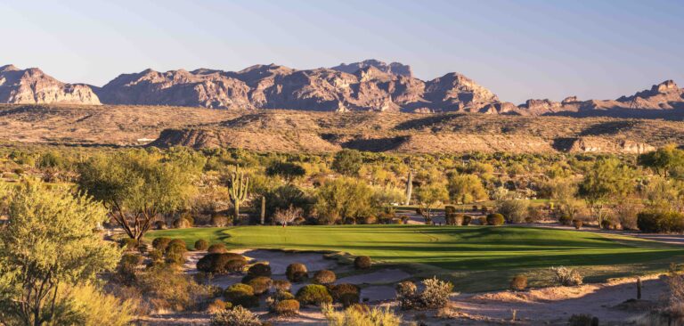 We-Ko-Pa Saguaro fairway with desert mountains behind