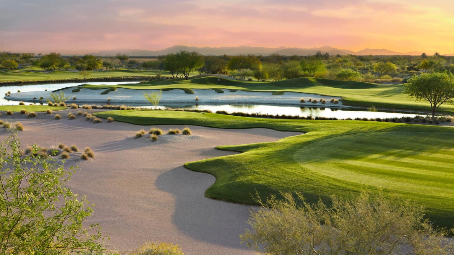 Longbow Golf Club bunkers and water at sunrise in Mesa, Arizona