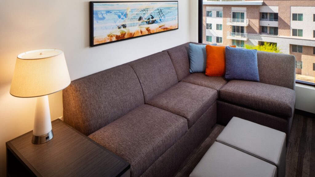 Cozy Corner sectional sofa in a guest room at Hyatt Place and Hyatt House North Scottsdale