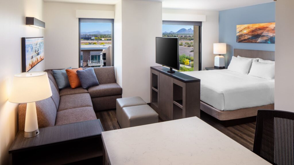 Hyatt House North Scottsdale studio suite with sofa and king bed