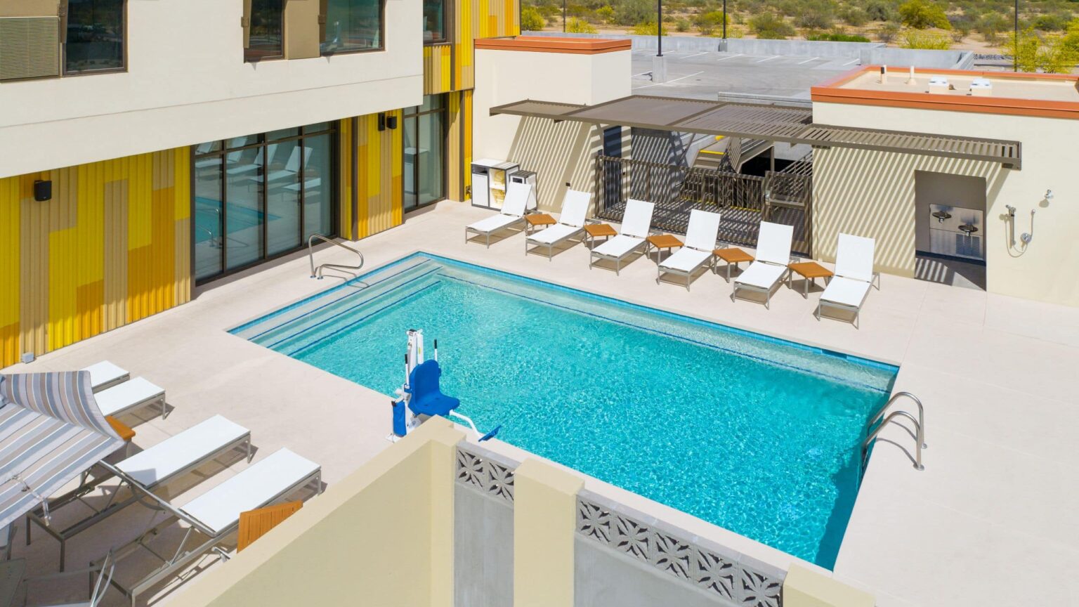Heated outdoor pool and loungers at Hyatt Place and Hyatt House North Scottsdale
