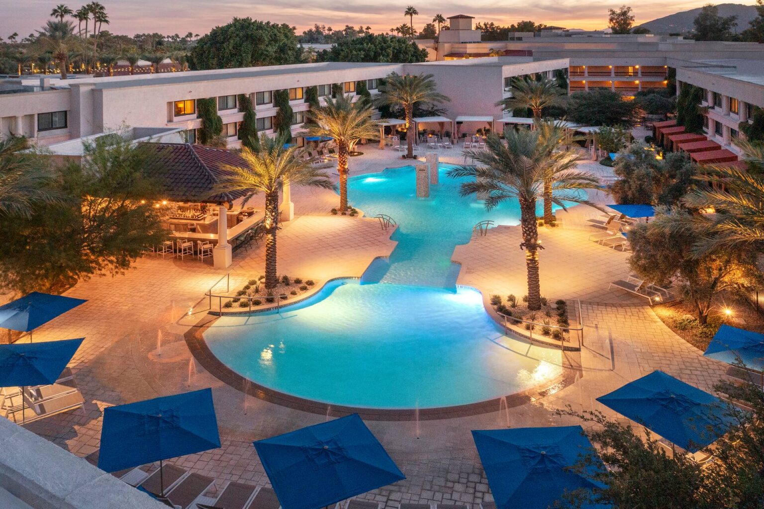 Main pool and cabanas at dusk at Scottsdale Resort and Spa, Scottsdale Arizona