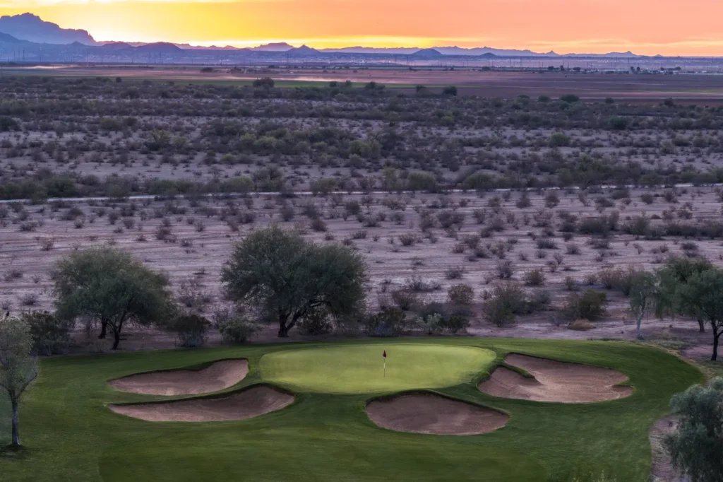 Bunkered green at sunrise on the Piipaash Course at Talking Stick Golf Club, Scottsdale Arizona