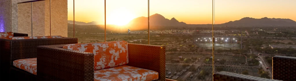Orange Sky lounge seating with a sunset view at Talking Stick Resort
