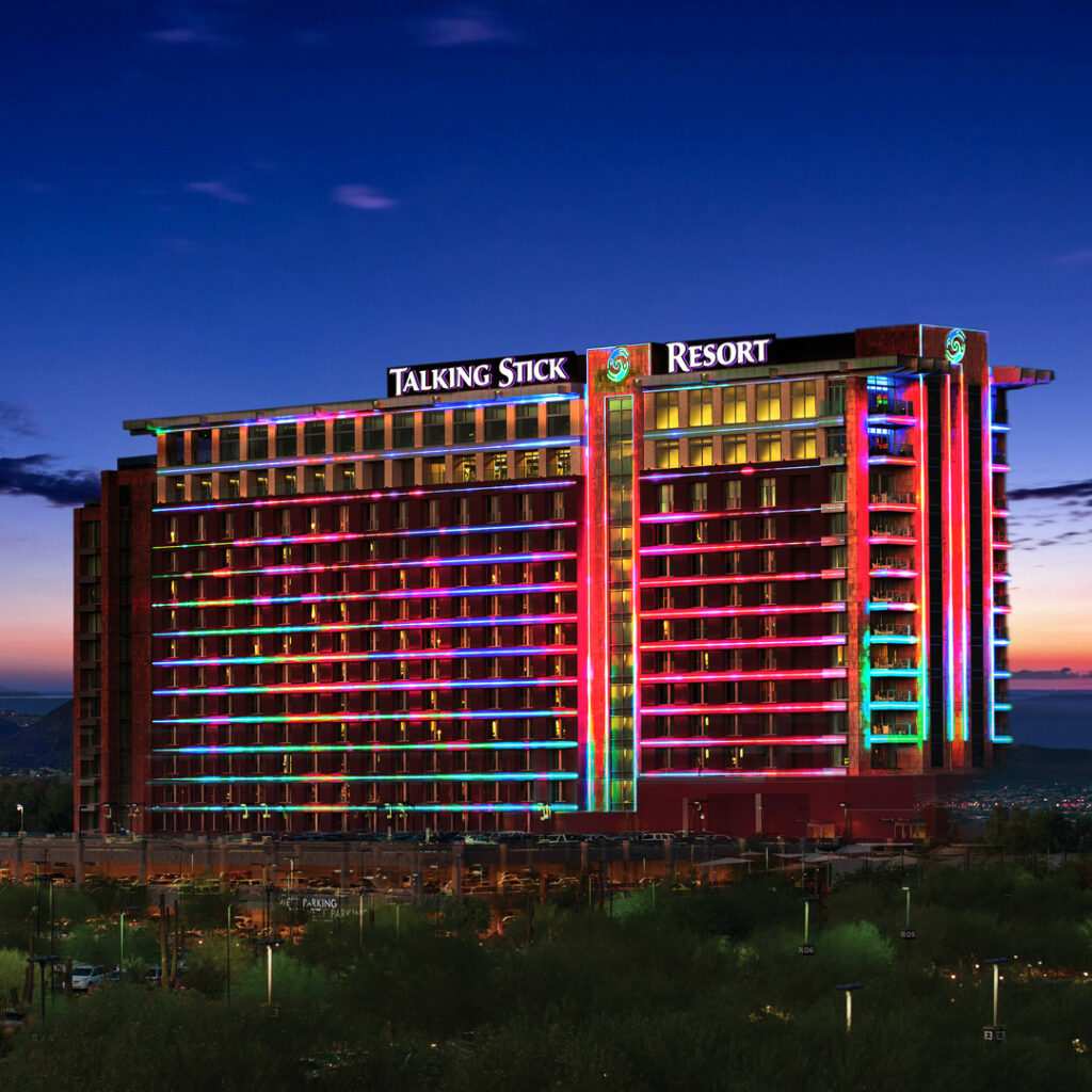 Talking Stick Resort tower lit up at night