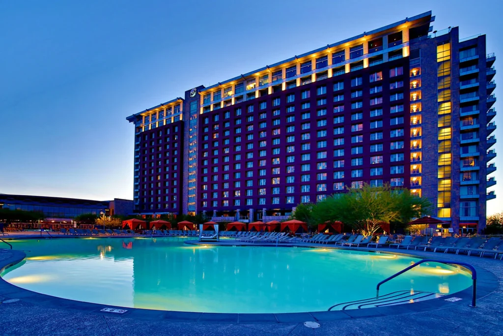 Talking Stick Resort tower above the main pool at dusk, Scottsdale Arizona